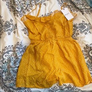 Yellow polka dot romper
